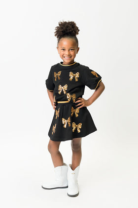 Belle Cher Black and Gold Bows Top