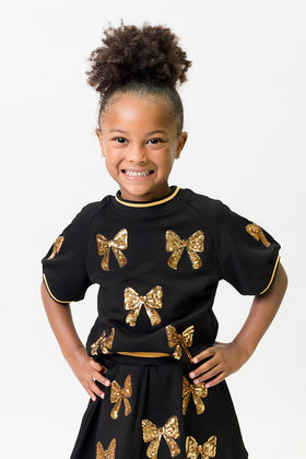Belle Cher Black and Gold Bows Top