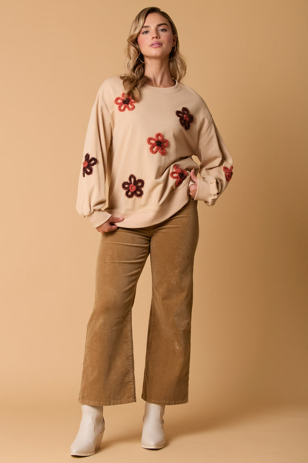 LONG SLEEVE SWEATSHIRT W/FLOWER EMBELLISHMENT