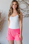 SOLID CASUAL SHORT PANTS WITH SMOCKED BOLD WAIST BAND AND SIDE SLIT DETAIL