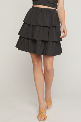 Textured ruffle tiered mini skirt featuring elastic waistband